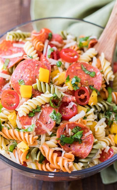 Creamy goats cheese and tangy roasted cherry tomatoes create a smooth, fresh taste in this quick and easy pasta salad. Pepperoni Pasta Salad Recipe | Tri-Color Rotini Pasta Salad