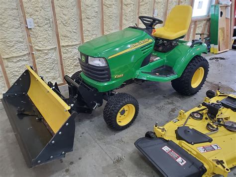 John Deere X585 4x4 Garden Tractor And Attachments Regreen Equipment