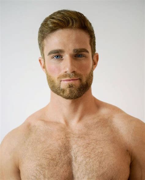 A Man With A Beard And No Shirt On