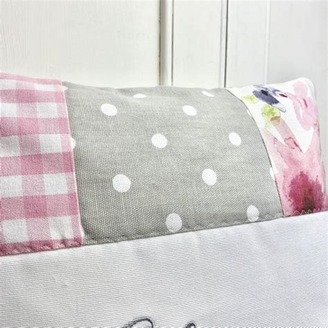 pink and grey patchwork name cushion by tuppenny house designs