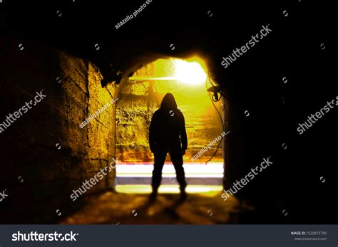 Man Standing Underground Corridor Man Tunnel Stock Photo 1520875799
