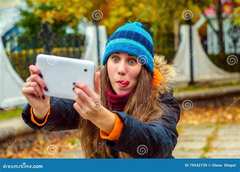 girl making a funny selfie street stock image image of beauty countryside 79542739