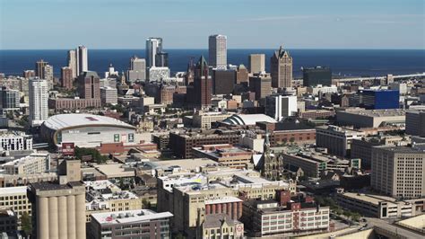 5 7k stock footage aerial video a view of the city s skyline and arena in downtown milwaukee