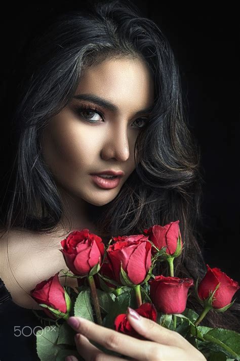 Beautiful Young Woman With Red Rose Beautiful Young Woman With Red Rose In Hand Beautiful