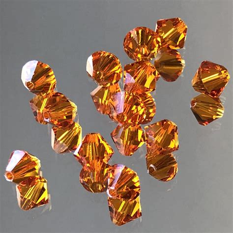 Swarovski Crystals 4 And 6mm Orange Crystal Bicone Beads Etsy Orange