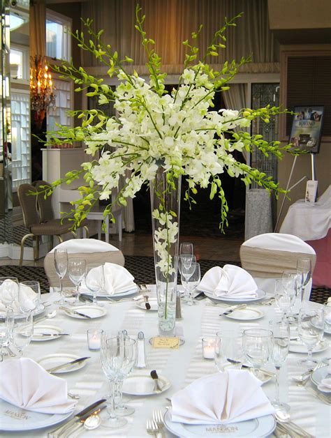 Stunning And Elegant All White Dendrobium Orchid Centerpiece By Jacqueline  Tall Wedding