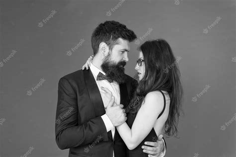 Premium Photo We Are Together Couple In Love Red Background Loving Couple Hug In Formal Wear