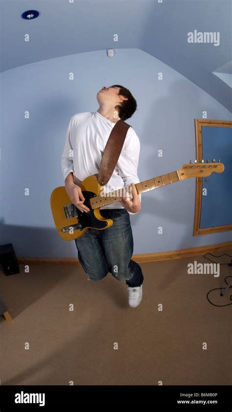 Guitarist Teenage Boy Playing Guitar Stock Photo Alamy