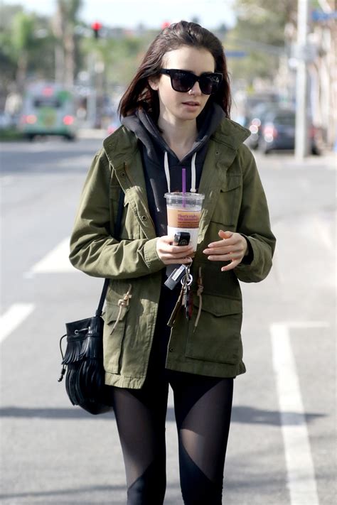 Lily Collins In Spandex Leaves The Gym With A Cold Drink West