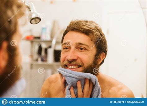 Young Attractive Man Looking In Mirror In Morning Stock Photo Image
