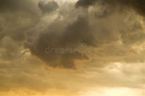 Storm Clouds In The Sky At Sunset As Background Stock Photo Image Of