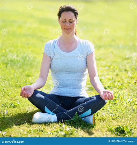 Young Lady Doing Yoga Exercise At A Park Stock Photo Image Of Hands