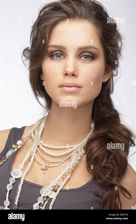 Sophisticated Woman With Ornamentation Pearly Necklace Stock Photo