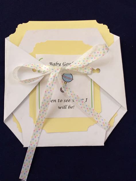 This is an effective way to generate suspense among your guests. Baby diaper gender reveal with riddle inside! | Gender reveal party, Reveal parties, Gender reveal
