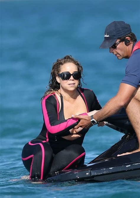 Mariah Carey Wetsuit Boob Slip While Trying To Climb On Jet Ski