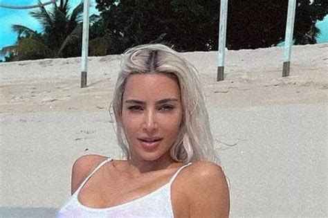 Kim Kardashian Leaves Little To The Imagination As She Poses In See Through White Bikini Daily