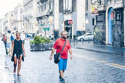 Catania Sicily â€ August 15 2018 People Walk On Historical Street