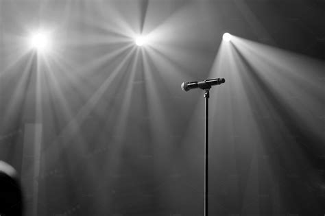 Microphone On Stage With Spotlight Arts And Entertainment Stock Photos