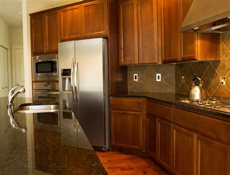 Once you have prepared the work area, give the cabinets a thorough cleaning. How to Choose Wood Stain Colors for Kitchen Cabinets ...