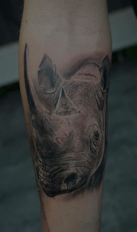 Rhinoceros Tattoo Rhino By Norbert Bogdan Rhino Tattoo Calf Tattoo