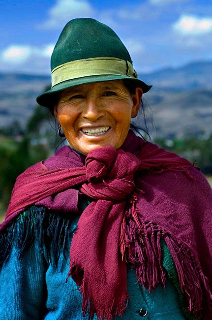 Indigeneous Woman Wears Traditional Dress In Ecuador Anthony John