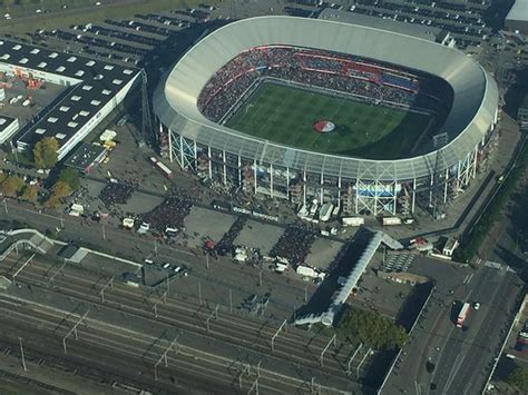 Oma and lola landscape architects reveal refined design development for the new feyenoord stadium. Rotterdam Stadion