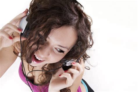 The Young Woman Listens To Music In Ear Phones Stock Image Image Of