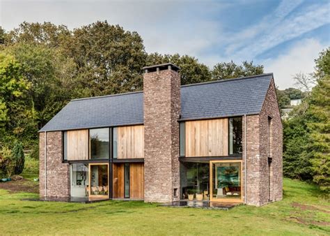 Sandstone Clad House In Wales Resembles Local Barns
