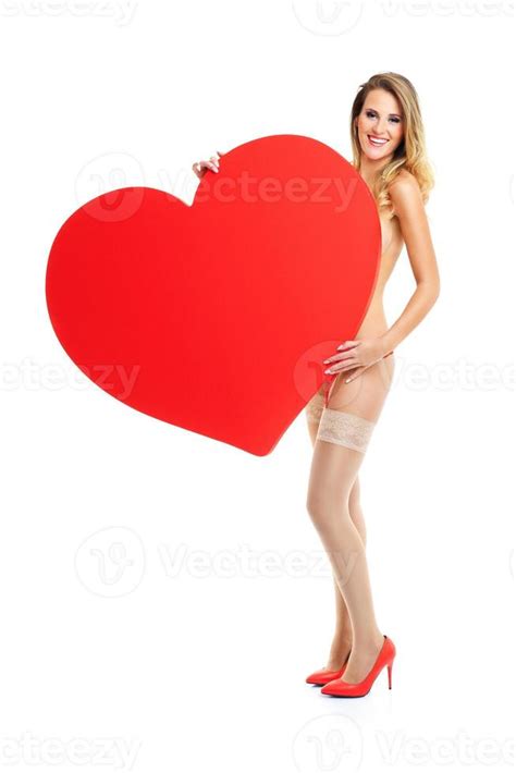 Sexy Valentine Woman Holding A Heart Stock Photo At Vecteezy