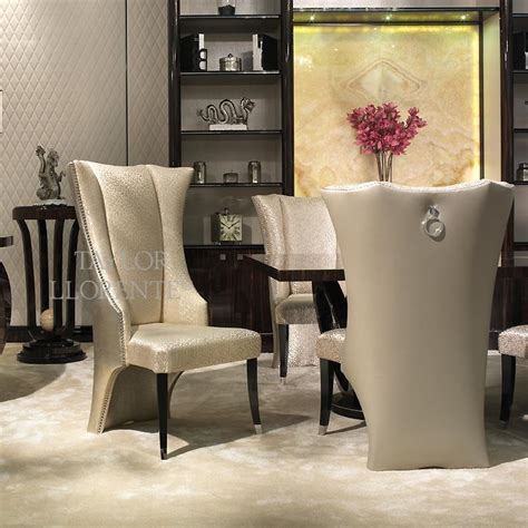 Browse a large selection of dining room chairs, including metal, wood and upholstered dining chairs in a variety of colors for your kitchen or dining area. DESIGNER HIGH BACK WING CHAIRS | TAYLOR LLORENTE FURNITURE