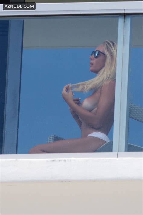 laura cremaschi topless in her hotel balcony in miami beach aznude