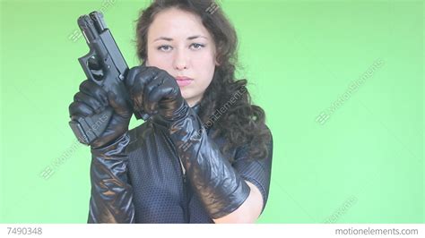 Green Screen Girl Shooting With Gun 3 Stock Video Footage 7490348