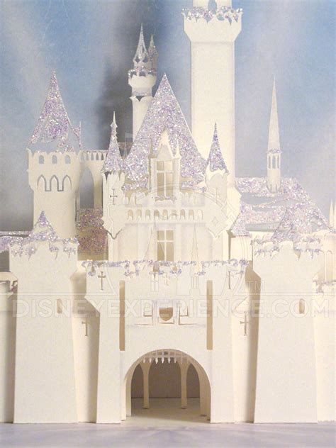 Add glue to the layer and attach to the inner card layer. Sleeping Beauty Castle Holiday Pop-Up Card