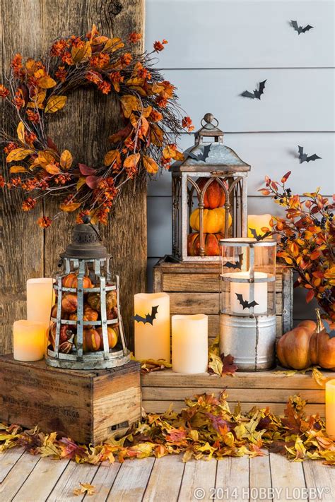 Fill Lanterns With Pumpkins And Other Fall Pieces For An