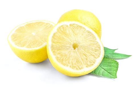 Yellow Lemon And Two Halves Isolated On A White Background With Green