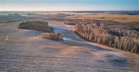 Premium Photo Winter Agricultural Field Under Snow Panorama Aerial