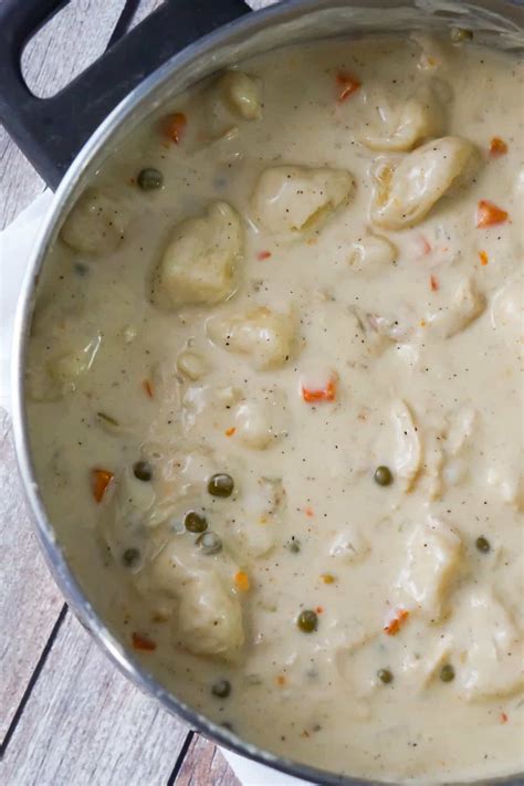 How to make chicken and dumplings with canned biscuits bring the chicken broth and seasonings to a boil in a large pot. Easy Chicken and Dumplings with Biscuits - This is Not ...