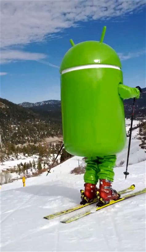 Android Guy Skiing On The Slopes
