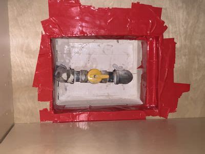 Turn off the main water supply for the house. Is this the gas shut off valve? This is in under/in my ...