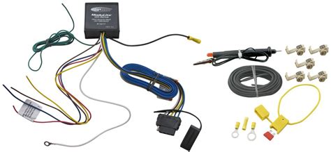 This project requires a trailer lighting kit that includes a wiring harness, small connection clips, a couple rear turn signals and a couple side mounted lights. 119177KIT