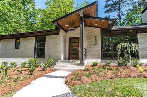 What are the features of a mid century home? Asking $689K, Decatur ranch juxtaposes midcentury ...