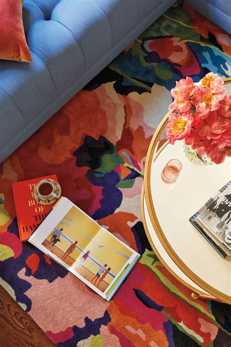 Table top with an inlay detail in polished calacatta bianco marble. Lacquered Round Coffee Table | Anthropologie