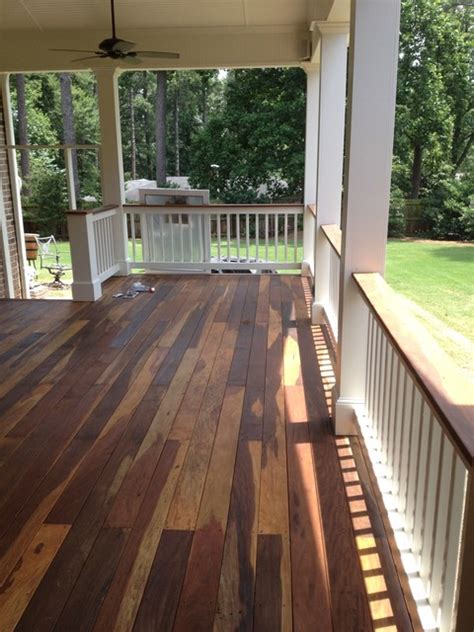 If you are planning on laying a new patio or replacing an existing one, it can be an enjoyable project to design. Covered IPE Wood Deck - Traditional - Porch - atlanta - by Equis Enterprises