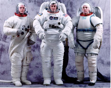 Nasa astronauts from left to right: Didn't Elon say something about revealing space (flight?) suits by the end of this year? : spacex