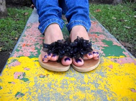 latina central american soles and feet black sandals and sweaty soles after shopping