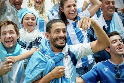 Argentinian Football Fans Watching Football Match Stock Photo Dissolve