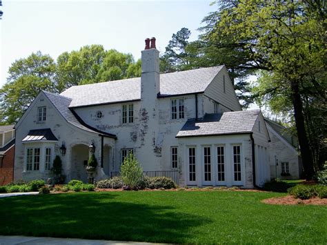 The bricks soak up the wash pretty quickly. Limewash Brick | Painted brick house, White wash brick ...