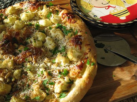 Roasted Cauliflower Pizza With Roasted Garlic And Pine Nuts