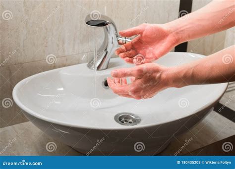 Man Washing Hands With Water And Soap In Bathroom Stock Image Image