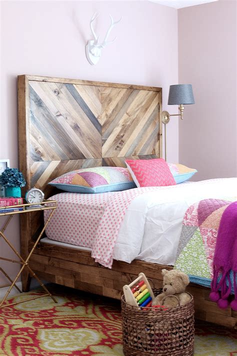 The planks on the diy platform bed are neither screwed in or nailed, which makes taking the bed frame apart a breeze. How to build a DIY Reclaimed Wood Chevron West Elm Alexa Bed